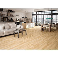 Thumbnail image of Living room area with porcelain wood look tile in neutral beige tones on floor.